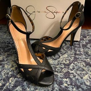 Black Jessica Simpson, leather, open toe heels with T- strap. Size 8.5.